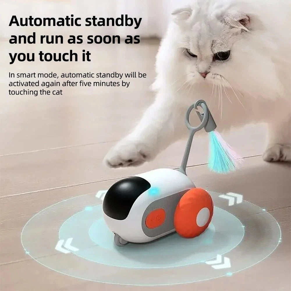 Automatic toy car for cats with a feather attachment to spark curiosity.