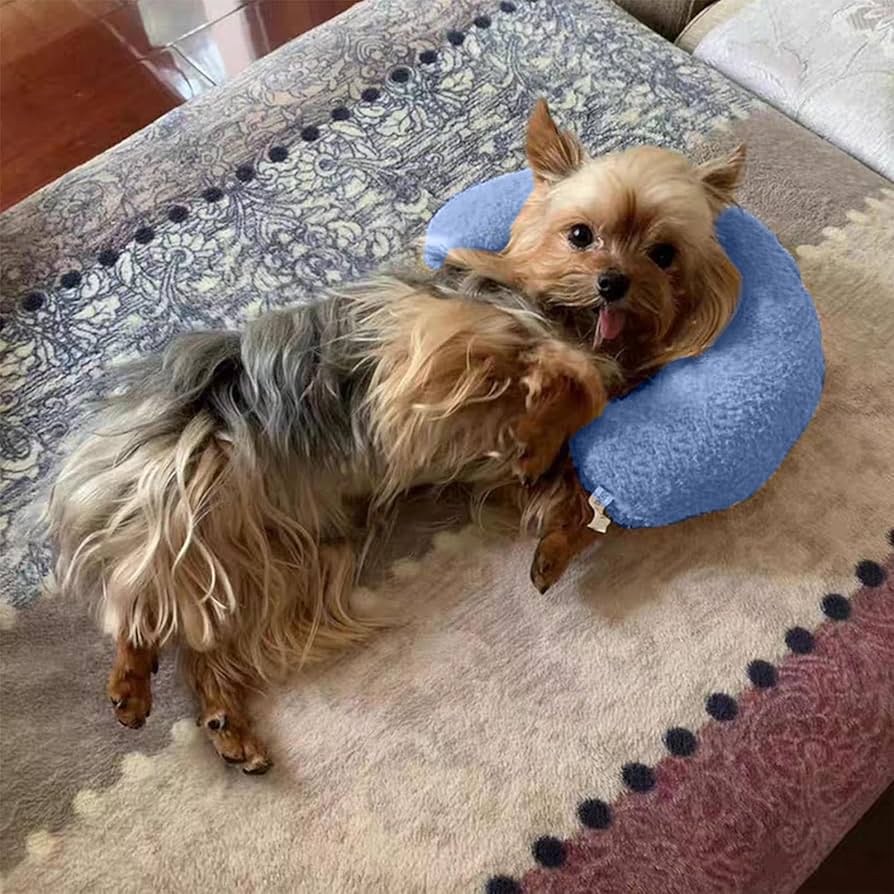 Small dog lying comfortably on a soft fabric dog calming pillow at home