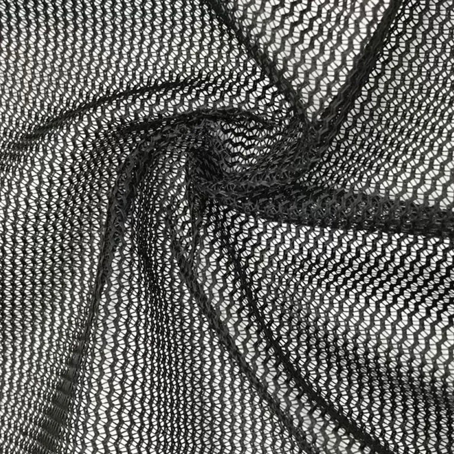 Close-up view of the retractable dog gate mesh fabric showing flexible and sturdy material texture