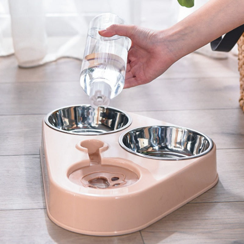 Stylish green 3-in-1 automatic pet feeder with dual stainless steel bowls and a water dispenser.