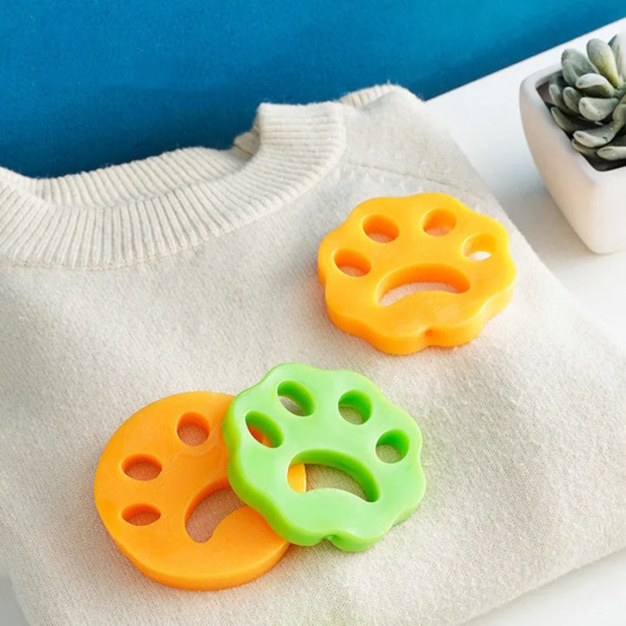 Green and orange sticky pet hair remover with reusable surface