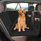 Waterproof dog car seat cover installed on back seat with safety leash attached, providing stable and protected space for a dog during travel.