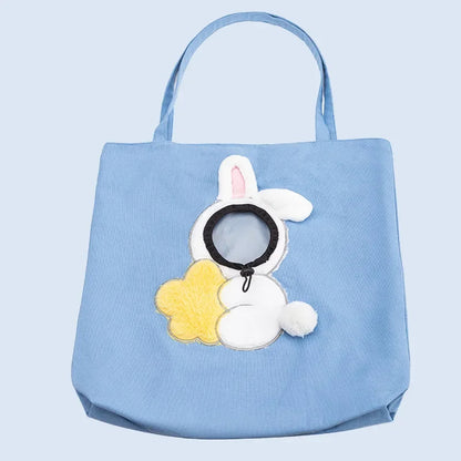 Blue cotton pet carrier bag with bunny design, sling-style tote for carrying small pets comfortably