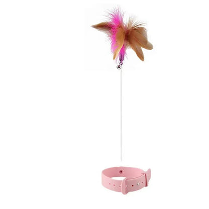 Pink silicone cat collar with feather teaser toy for interactive play