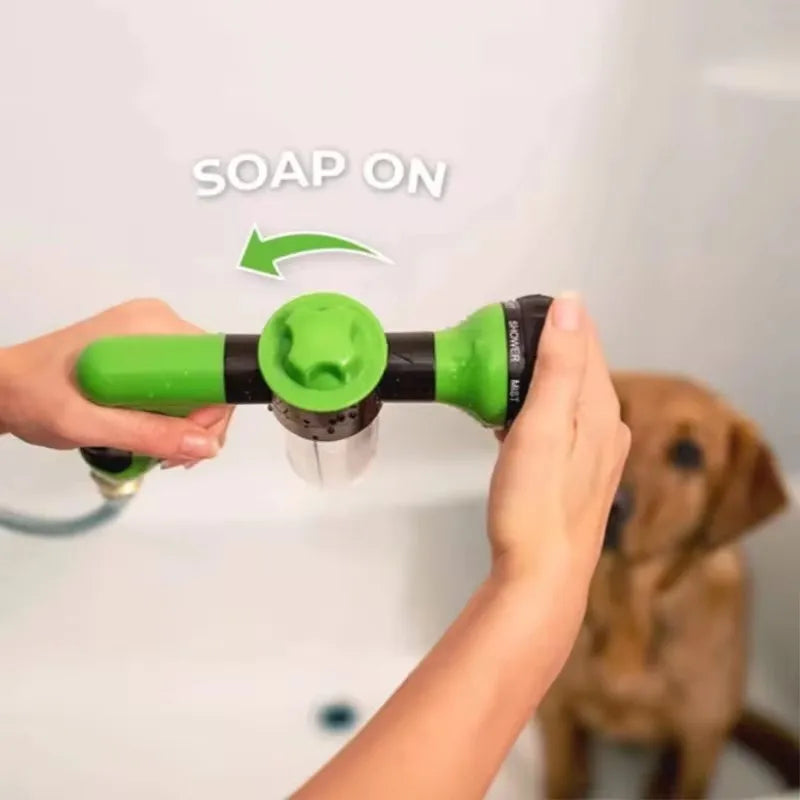 Dog bathing kit showing soap dispenser function activated during dog washing.