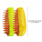 Electric cat steam brush in green and yellow colors showing product dimensions 4.52 × 2.95 × 2.36 inches (11.7 × 7.5 × 6 cm).