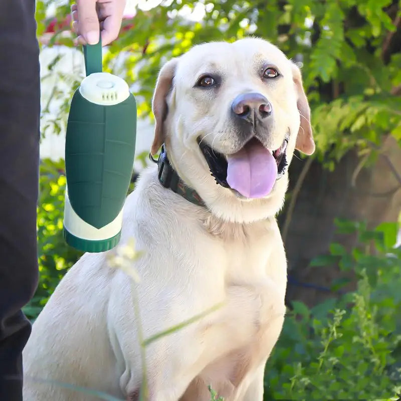 Feeding a dog using the food container of a portable pet bottle