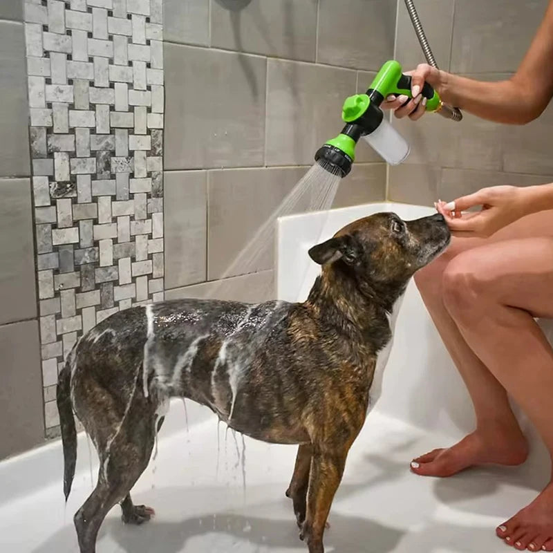 Dog bathing kit used indoors to gently rinse a dog during bath time.